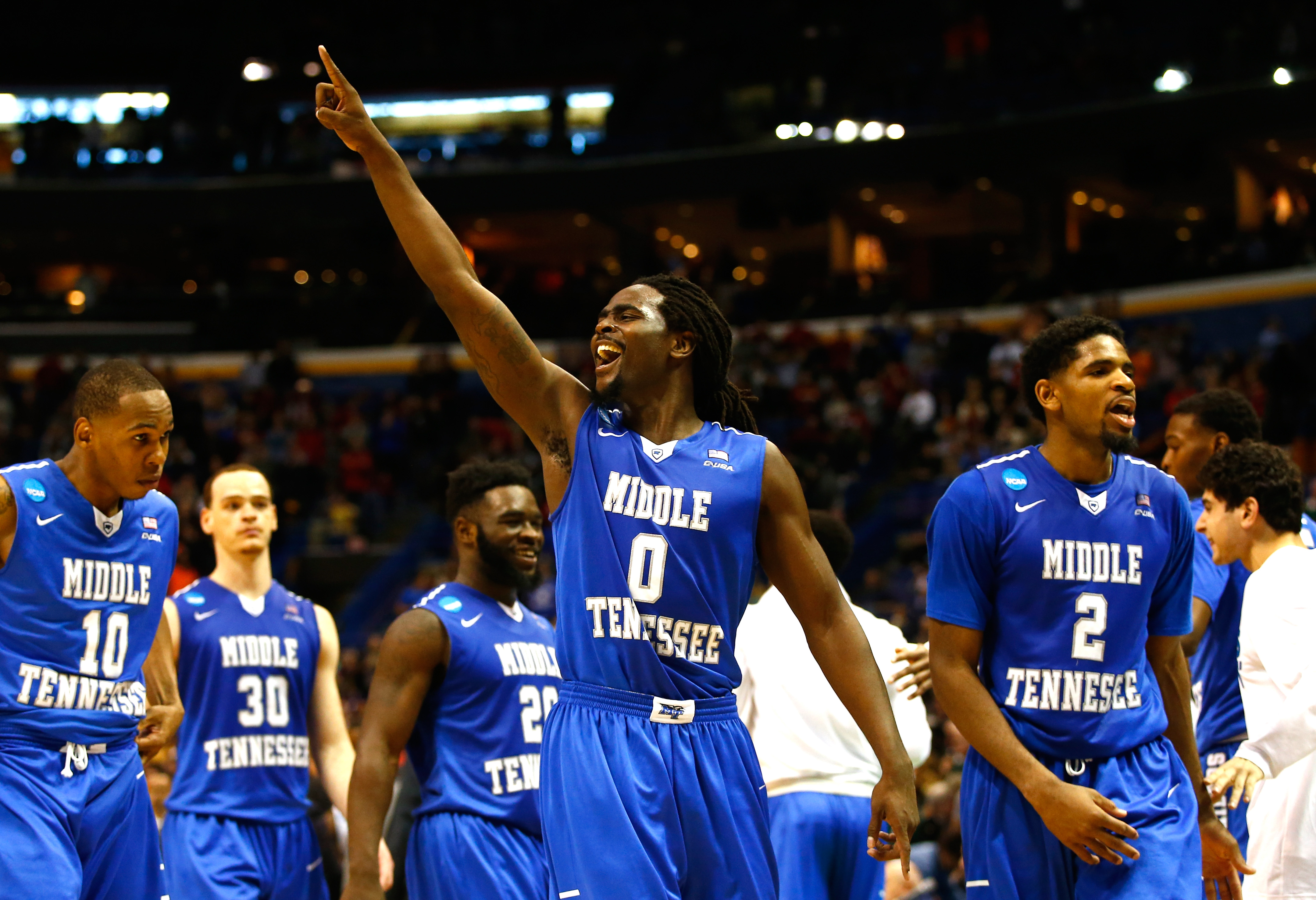 ST LOUIS, MO - MARCH 18: Darnell Harris #0 of the Middle Tennessee Blue Raiders celebrates late in the game against the Michigan State Spartans during the first round of the 2016 NCAA Men's Basketball Tournament at Scottrade Center on March 18, 2016 in St Louis, Missouri. (Photo by Jamie Squire/Getty Images)
