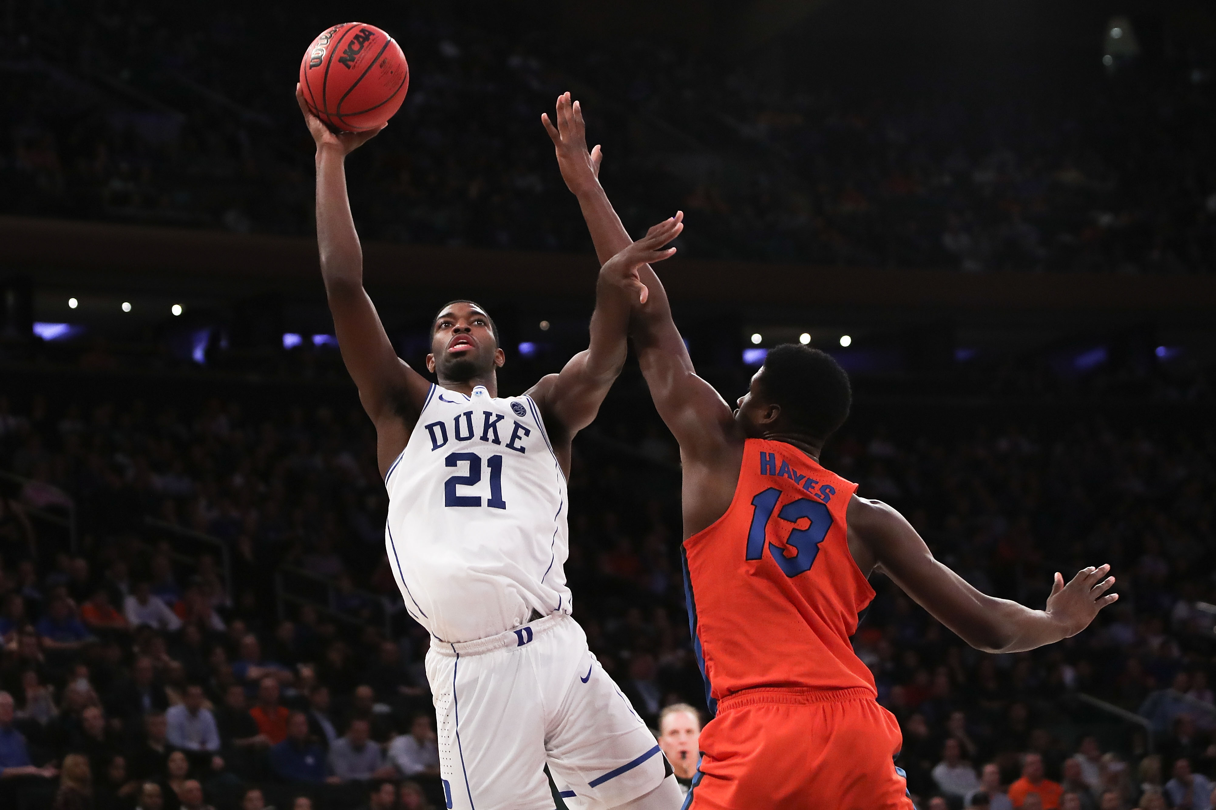 NEW YORK, NY - DECEMBER 06: Amile Jefferson #21 of the Duke Blue Devils puts up a shot against the Florida Gators in the second half during the Jimmy V Classic at Madison Square Garden on December 6, 2016 in New York City. (Photo by Michael Reaves/Getty Images)