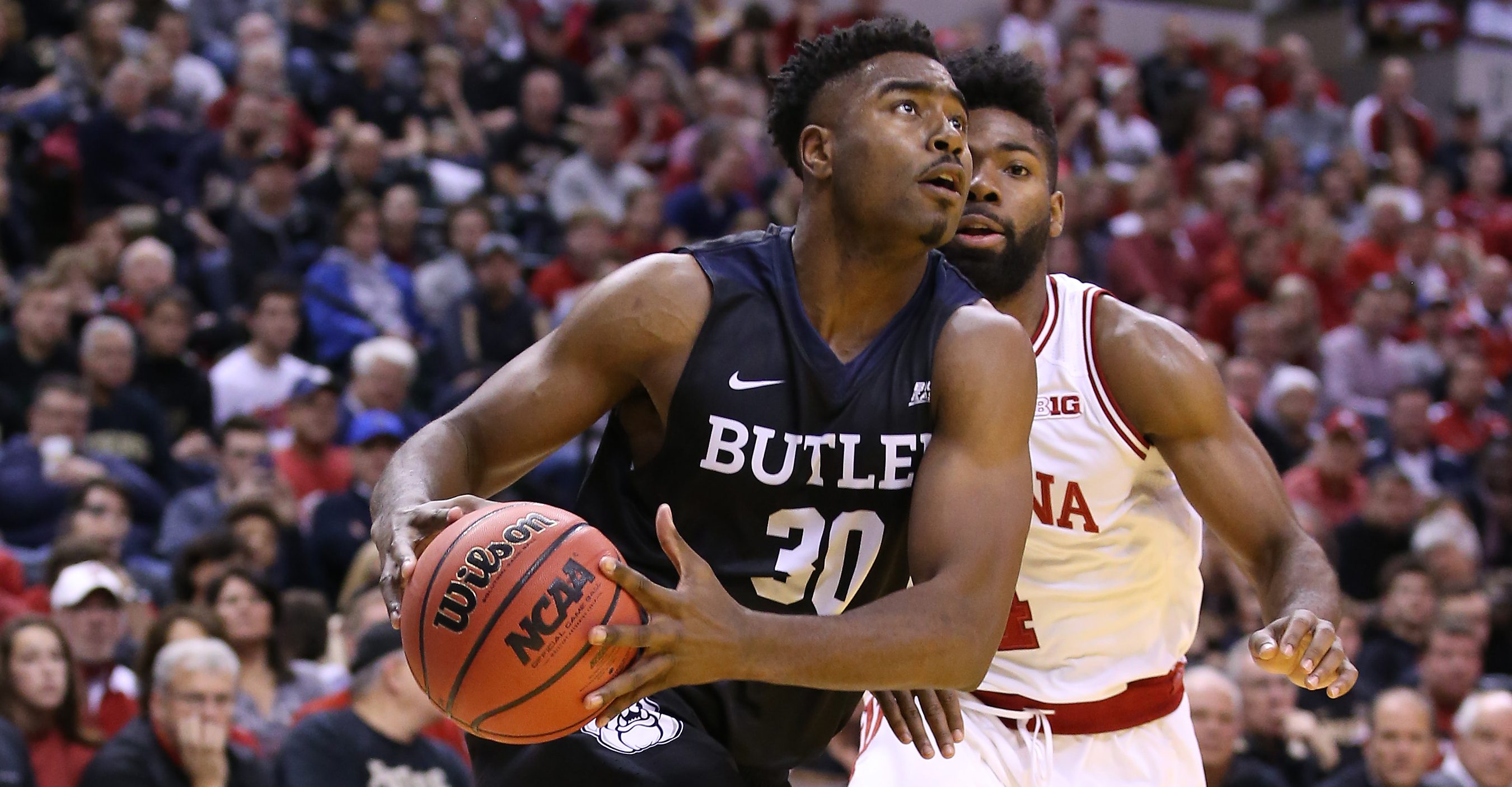 INDIANAPOLIS, IN - DECEMBER 17: Kelan Martin #30 of the Butler Bulldogs dribbles the ball during the 83-78 win over the Indiana Hoosiers during the Crossroads Classic at Bankers Life Fieldhouse on December 17, 2016 in Indianapolis, Indiana. (Photo by Andy Lyons/Getty Images)