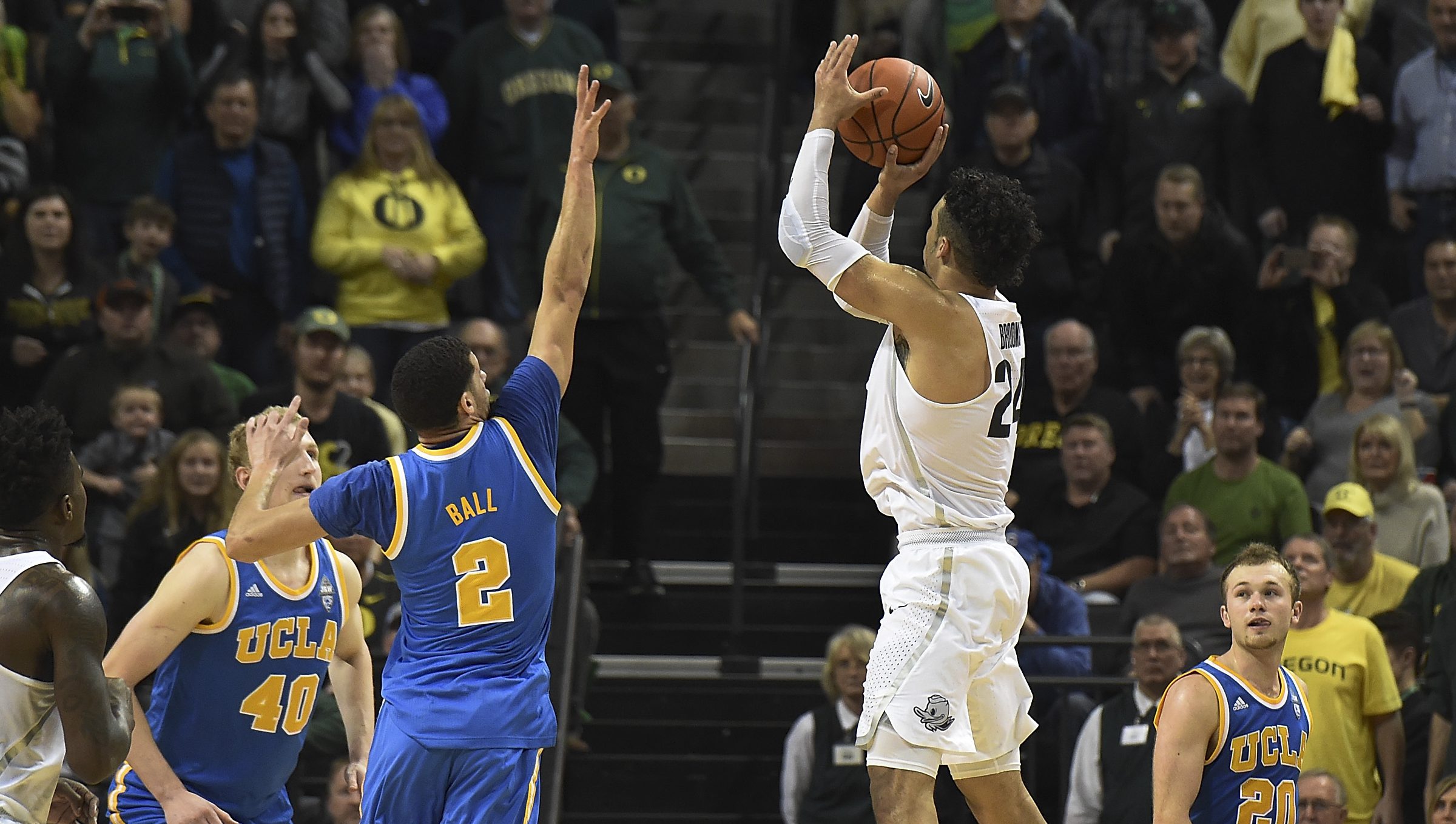 EUGENE, OR - DECEMBER 28: Dillon Brooks #24 of the Oregon Ducks hits the game winning shot over Lonzo Ball #2 and Bryce Alford #20 of the UCLA Bruins on December 28, 2016 at Matthew Knight Arena in Eugene, Oregon. (Photo by Steve Dykes/Getty Images)