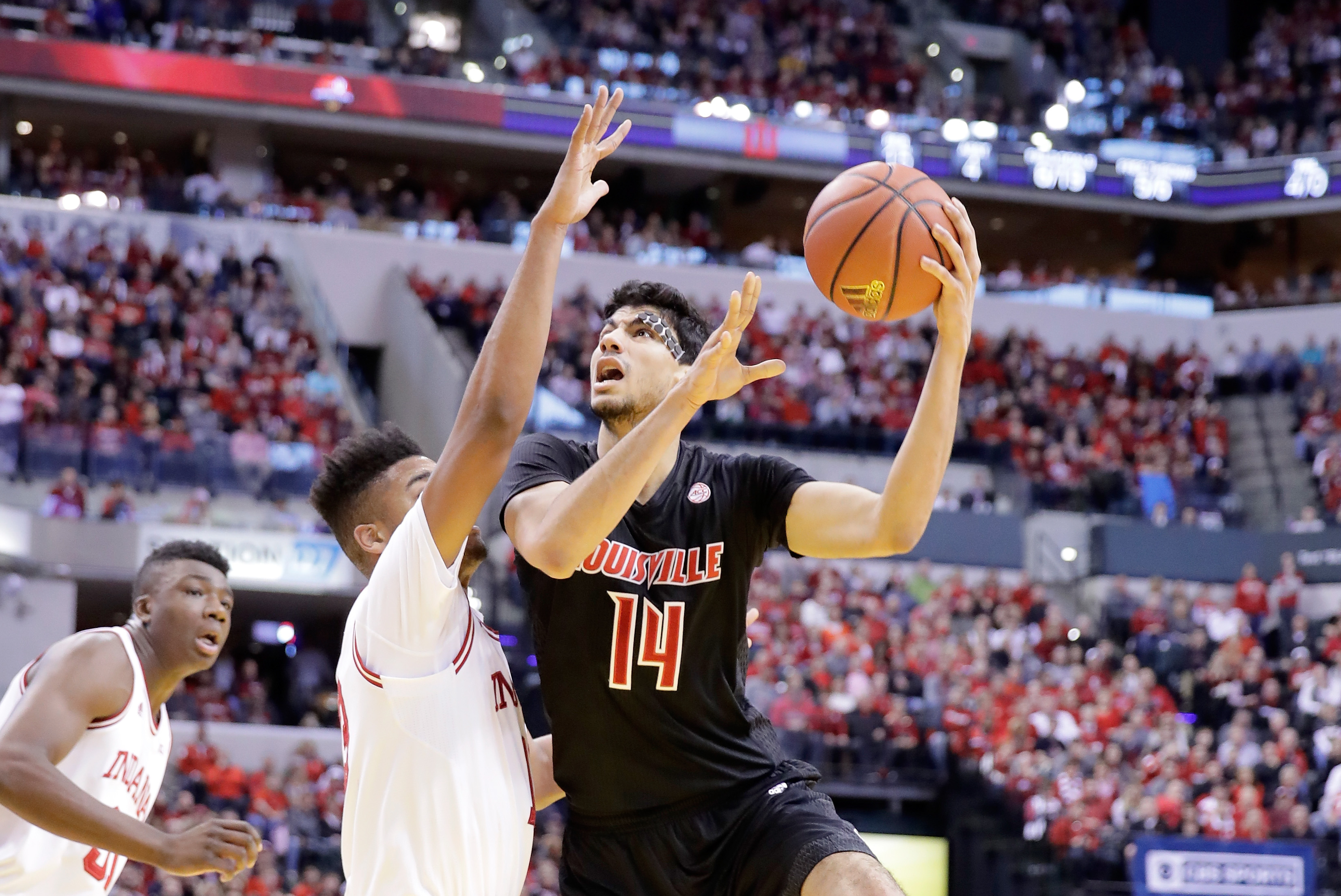 INDIANAPOLIS, IN - DECEMBER 31: Anas Mahmoud #14 of the Louisville Cardinals shoots the ball during the game against the Indiana Hoosiers in the Countdown Classic at Bankers Life Fieldhouse on December 31, 2016 in Indianapolis, Indiana. (Photo by Andy Lyons/Getty Images)
