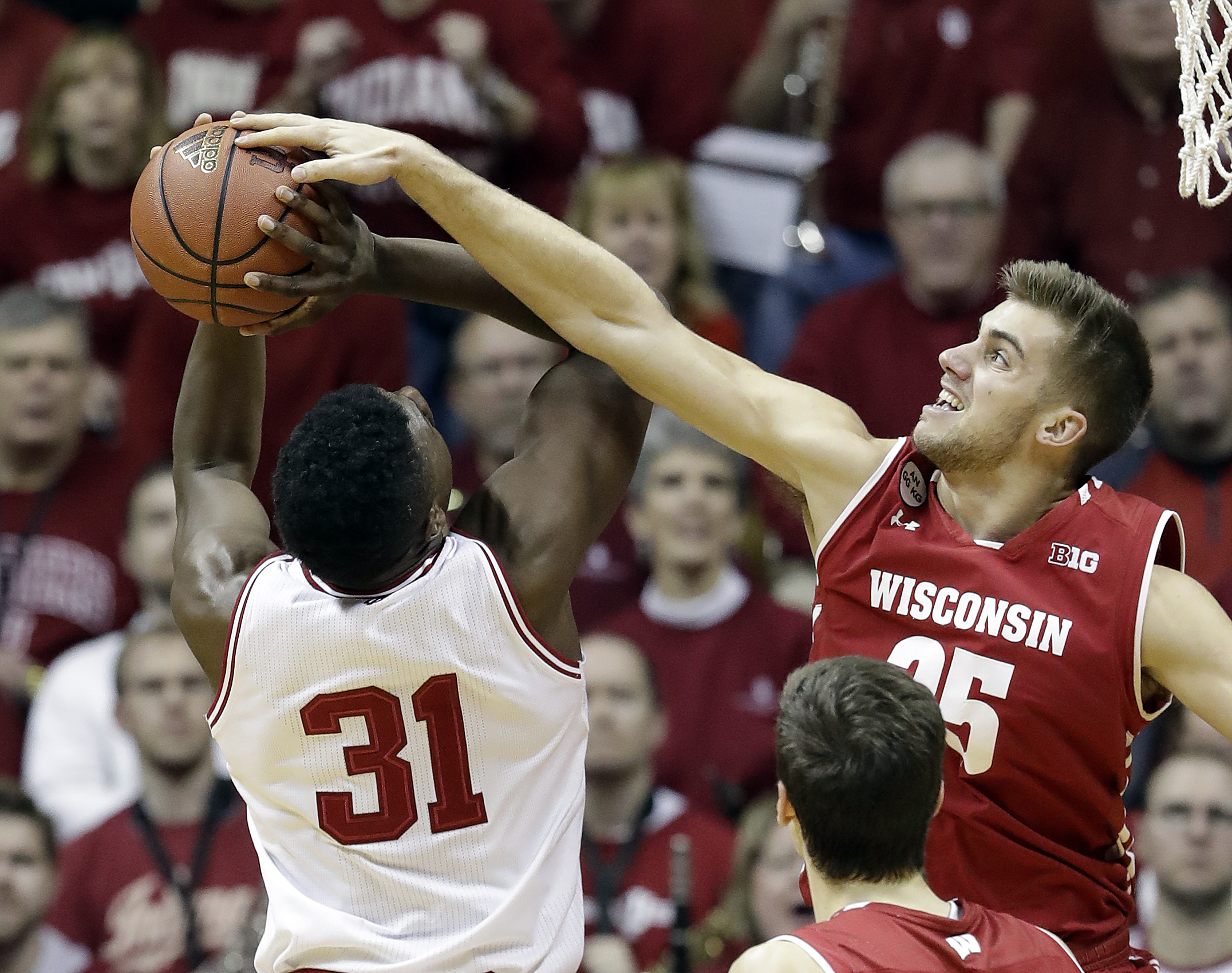 Indiana's Thomas Bryant has his shot blocked by Wisconsin's Alex Illikainen during the first half of an NCAA college basketball game Tuesday, Jan. 3, 2017, in Bloomington Ind. (AP Photo/Darron Cummings)