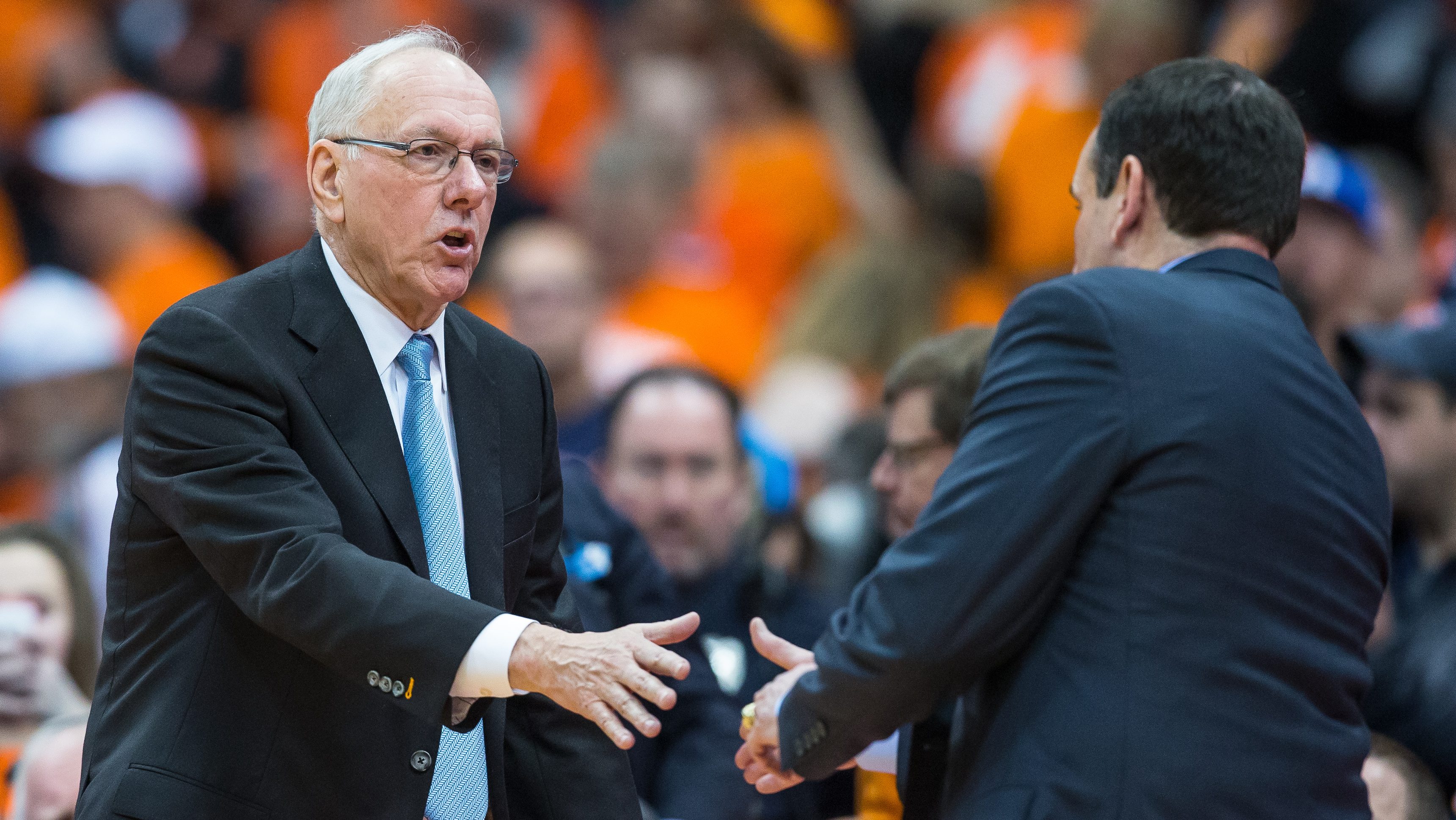 SYRACUSE, NY - FEBRUARY 14: Head coach Jim Boeheim of the Syracuse Orange shakes the hand of Head coach Mike Krzyzewski of the Duke Blue Devils after the game on February 14, 2015 at The Carrier Dome in Syracuse, New York. Duke defeats Syracuse 80-72. (Photo by Brett Carlsen/Getty Images)