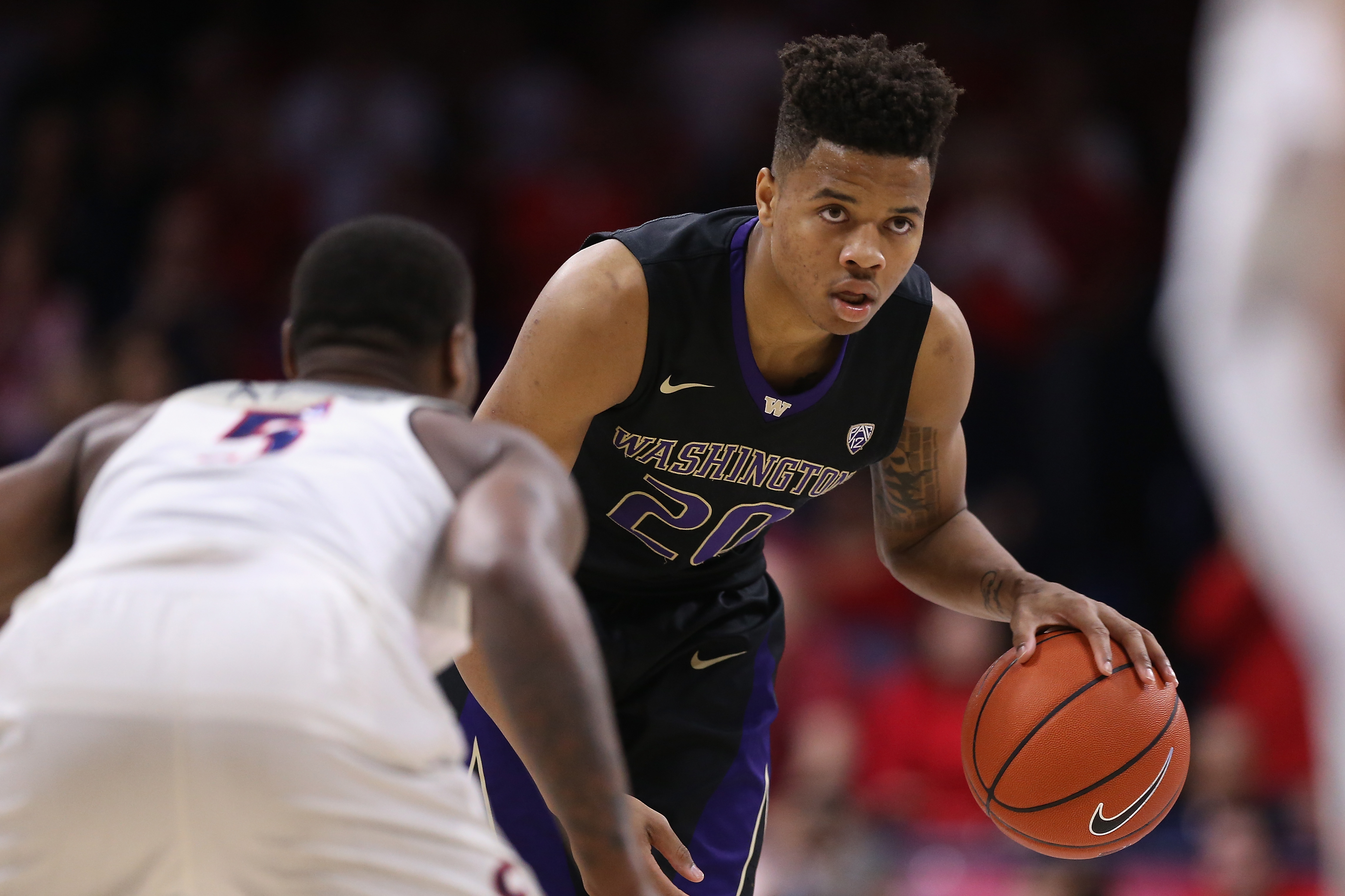 TUCSON, AZ - JANUARY 29:  Markelle Fultz #20 of the Washington Huskies handles the ball during the second half of the college basketball game against the Arizona Wildcats at McKale Center on January 29, 2017 in Tucson, Arizona. The Wildcats defeated the Huskies 77-66.  (Photo by Christian Petersen/Getty Images)