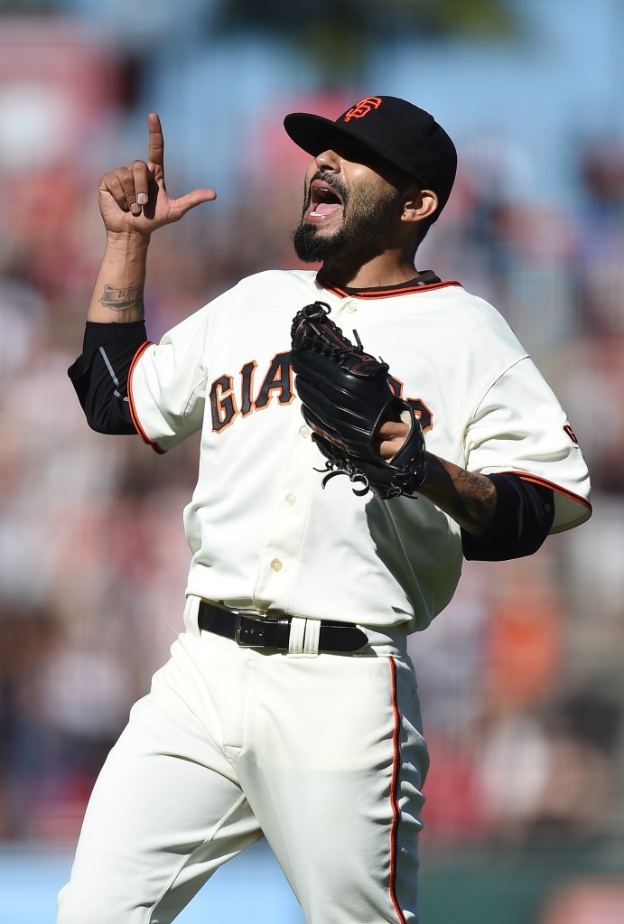 SAN FRANCISCO, CA - AUGUST 16: Sergio Romo #54 of the San Francisco Giants celebrates after defeating the Philadelphia Phillies 6-5 at AT&T Park on August 16, 2014 in San Francisco, California. (Photo by Thearon W. Henderson/Getty Images)