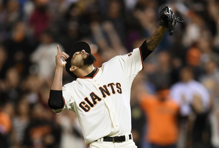 SAN FRANCISCO, CA - MAY 15: Sergio Romo #54 of the San Francisco Giants celebrates defeating the Miami Marlins 6-4 at AT&T Park on May 15, 2014 in San Francisco, California. (Photo by Thearon W. Henderson/Getty Images)