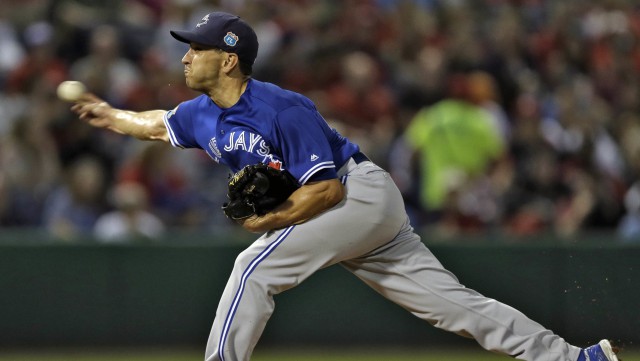 Toronto Blue Jays' Pat Venditte pitches to the Philadelphia Phillies during the fourth inning of a spring training baseball game Friday, March 25, 2016, in Clearwater, Fla. (AP Photo/Chris O'Meara)