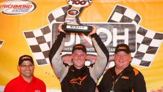 RICHMOND, VA - SEPTEMBER 10: Austin Hill, driver of the #22 A&D Welding/Don Rich Ford Co. Ford, celebrates after winning the K&N Pro Series East UNOH 100 at Richmond International Raceway on September 10, 2015 in Richmond, Virginia. (Photo by Brian Lawdermilk/Getty Images)