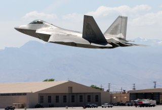 NELLIS AFB, NV - APRIL 25: A United States Air Force F-22 Raptor takes off from Nellis Air Force Base while participating in the Joint Expeditionary Force Experiment 2006 (JEFX 06) April 25, 2006 in Las Vegas, Nevada. JEFX is a biannual test of new systems and technologies by every branch of the military in an attempt to speed their introduction into the modern battlefield. This year's tests involve about 1,400 personnel from the United States, Great Britain, Canada and Australia studying new technologies during mock combat over the Nevada desert and center on finding better ways to communicate critical information between armed forces. (Photo by Ethan Miller/Getty Images)