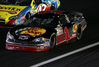 CONCORD, NC - MAY 19: Martin Truex Jr., driver of the #1 Bass Pro Shops Chevrolet, leads Bobby Labonte, driver of the #43 Cheerios/Betty Crocker Dodge, during the NASCAR Nextel All-Star Challenge on May 19, 2007 at Lowe's Motor Speedway in Concord, North Carolina. (Photo by Streeter Lecka/Getty Images)