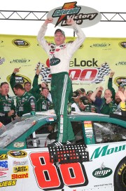 BROOKLYN, MI - JUNE 15: Dale Earnhardt Jr., driver of the #88 NationalGuard/AMP Energy Chevrolet, celebrates in victory lane after winning the NASCAR Sprint Cup Series Lifelock 400 at the Michigan International Speedway on June 15, 2008 in Brooklyn, Michigan. (Photo by Jerry Markland/Getty Images for NASCAR)