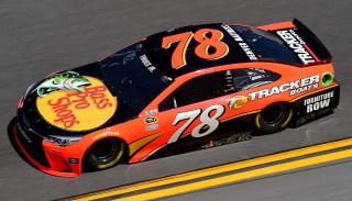 DAYTONA BEACH, FL - FEBRUARY 13: Martin Truex Jr., driver of the #78 Bass Pro Shops/Tracker Boats Toyota, practices for the NASCAR Sprint Cup Series Daytona 500 at Daytona International Speedway on February 13, 2016 in Daytona Beach, Florida. (Photo by Jared C. Tilton/Getty Images)