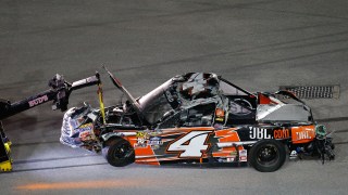 DAYTONA BEACH, FL - FEBRUARY 19: Christopher Bell, driver of the #4 JBL Toyota, is towed off the track after an on track incident during the NASCAR Camping World Truck Series NextEra Energy Resources 250 at Daytona International Speedway on February 19, 2016 in Daytona Beach, Florida. (Photo by Jonathan Ferrey/Getty Images)