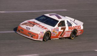 1993: Alan Kulwicki, driver of the #7 Hooters Ford Thunderbird competes during a race in 1993. (Photo by Bill Hall/Getty Images)