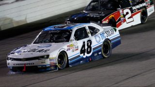 FORT WORTH, TEXAS - APRIL 08: Brennan Poole, driver of the #48 DC Solar Chevrolet, leads Austin Dillon, driver of the #2 Ruud/Smurfit Kappa Chevrolet, during the NASCAR XFINITY Series O'Reilly Auto Parts 300 at Texas Motor Speedway on April 8, 2016 in Fort Worth, Texas. (Photo by Ron Jenkins/Getty Images)