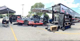 Each of ThorSport Racing's four teams worked in the parking lot of a grocery store after Monday's fire at the race shop. (Photo by Rico Abreu)