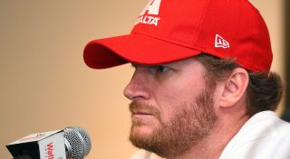 WATKINS GLEN, NY - AUGUST 05: Dale Earnhardt Jr., driver of the #88 Hendrick Motorsports Chevrolet, speaks to the media before practice for the NASCAR Sprint Cup Series Cheez-It 355 at Watkins Glen International on August 5, 2016 in Watkins Glen, New York. (Photo by Josh Hedges/Getty Images)