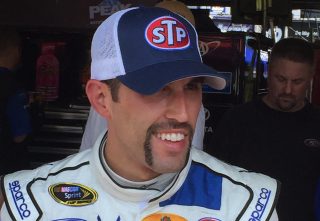 Aric Almirola sported a Fu Manchu mustache at last year's Southern 500 in honor of Richard Petty. (Photo: Dustin Long)