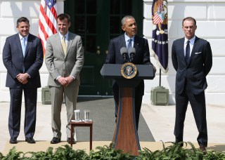 WASHINGTON, DC - APRIL 21: US President Barack Obama (2nd-R) speaks while flanked by NASCAR Champion driver Kevin Harvick (R) Crew Chief Rodney Childers (2nd-L) and owner Tony Stewart (L) during an event to honor the reigning NASCAR Sprint Cup Series champion on the south lawn of the White House April 21, 2015 in Washington, DC. Harvick drives the No. 4 Chevrolet for Stewart-Hass Racing in NASCARs Sprint Cup series. (Photo by Mark Wilson/Getty Images)