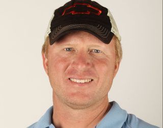 DAYTONA BEACH, FL - FEBRUARY 19: Crew chief Tommy Baldwin poses during 2012 NASCAR Sprint Cup Series Crew Chief portraits at Daytona International Speedway on February 19, 2012 in Daytona Beach, Florida. (Photo by Matthew Stockman/Getty Images)