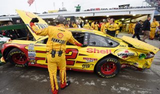 MARTINSVILLE, VA - NOVEMBER 01: The #22 Shell Pennzoil Ford of Joey Logano is towed into the garage after an incident with Matt Kenseth, driver of the #20 Dollar General Toyota, during the NASCAR Sprint Cup Series Goody's Headache Relief Shot 500 at Martinsville Speedway on November 1, 2015 in Martinsville, Virginia. (Photo by Jonathan Moore/Getty Images)