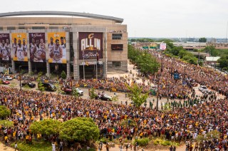 CLEVELAND, OH - JUNE 22: Cleveland fans celebrate during the Cleveland Cavaliers 2016 NBA Championship victory parade and rally on June 22, 2016 in Cleveland, Ohio. The Cavaliers defeated the Golden State Warriors to bring the first professional sports championship to the city of Cleveland since 1964. (Photo by Angelo Merendino/Getty Images)