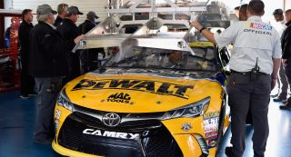 TALLADEGA, AL - OCTOBER 22: Matt Kenseth, driver of the #20 DeWalt Flexvolt Toyota, goes through inspection during qualifying for the NASCAR Sprint Cup Series Hellmann's 500 at Talladega Superspeedway on October 22, 2016 in Talladega, Alabama. (Photo by Jared C. Tilton/Getty Images)