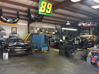 Morgan Shepherd works out of this garage, which sits across from his house in Conover, N.C.