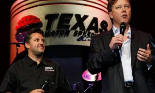 DALLAS - AUGUST 17: NASCAR chairman Brian France and Tony Stewart, driver of the #14 Office Depot/Old Spice Chevrolet during the 2011 Schedule Announcement Party at House of Blues on August 17, 2010 in Dallas, Texas. (Photo by Tom Pennington/Getty Images for Texas Motor Speedway)