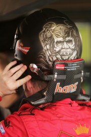 MARTINSVILLE, VA - MARCH 31: Dale Earnhardt Jr., driver of the #8 Budweiser Chevrolet, puts on his helmet prior to practice for the NASCAR Nextel Cup Series Goody's Cool Orange 500 at Martinsville Speedway on March 31, 2007 in Martinsville, Virginia. (Photo by Chris McGrath/Getty Images)