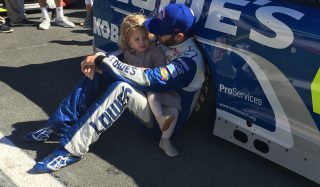 Jimmie Johnson spending some special family time before the fall race at Charlotte Motor Speedway that Johnson went on to win. (Photo: Dustin Long)