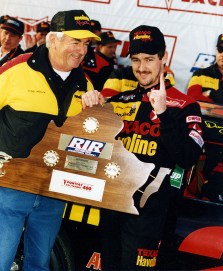 RICHMOND, VA ? March 7, 1993: Bobby Allison (L) joins his son, Davey Allison, in victory lane at Richmond International Raceway after Davey won the Pontiac Excitement 400 NASCAR Cup race. It would be the younger Allison?s final Cup victory. (Photo by ISC Images & Archives via Getty Images)