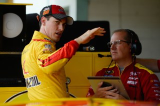HOMESTEAD, FL - NOVEMBER 19: Joey Logano, driver of the #22 Shell Pennzoil Ford, talks with crew chief Todd Gordon in the garage area during practice for the NASCAR Sprint Cup Series Ford EcoBoost 400 at Homestead-Miami Speedway on November 19, 2016 in Homestead, Florida. (Photo by Robert Laberge/Getty Images)