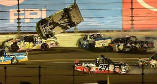 DAYTONA BEACH, FL - FEBRUARY 24: Matt Crafton, driver of the #88 Goof Off/Menards Toyota, flips during the NASCAR Camping World Truck Series NextEra Energy Resources 250 at Daytona International Speedway on February 24, 2017 in Daytona Beach, Florida. (Photo by Jared C. Tilton/Getty Images)